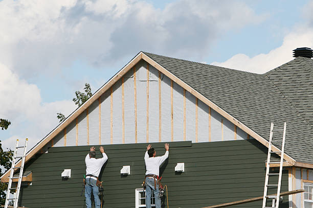 Professional Emergency Siding Repair technician working in Grindstone, PA